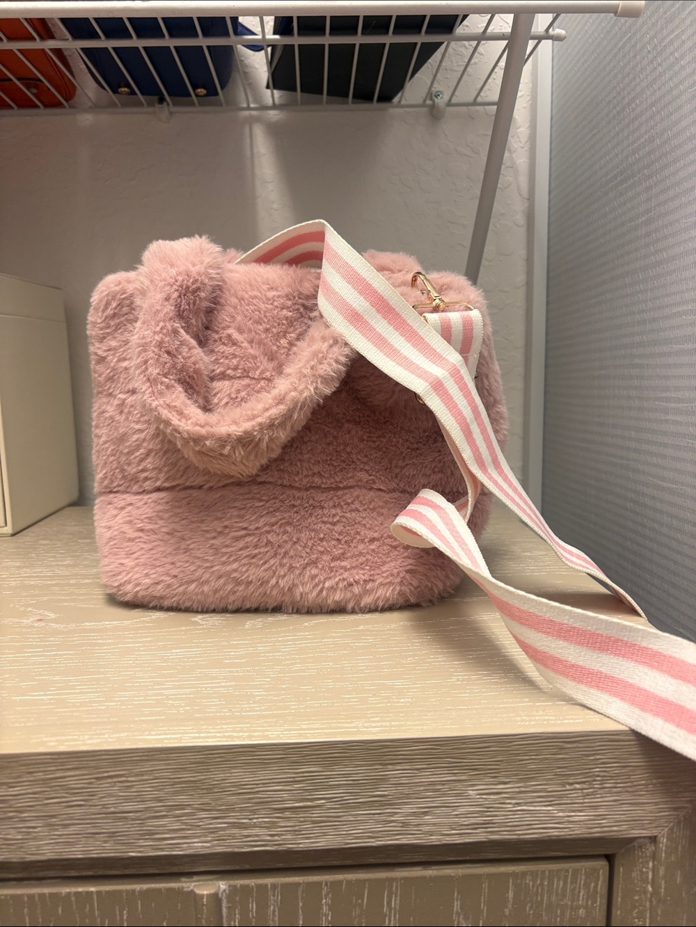 Plush Pink Faux-Fur Bucket Bag with Striped Strap